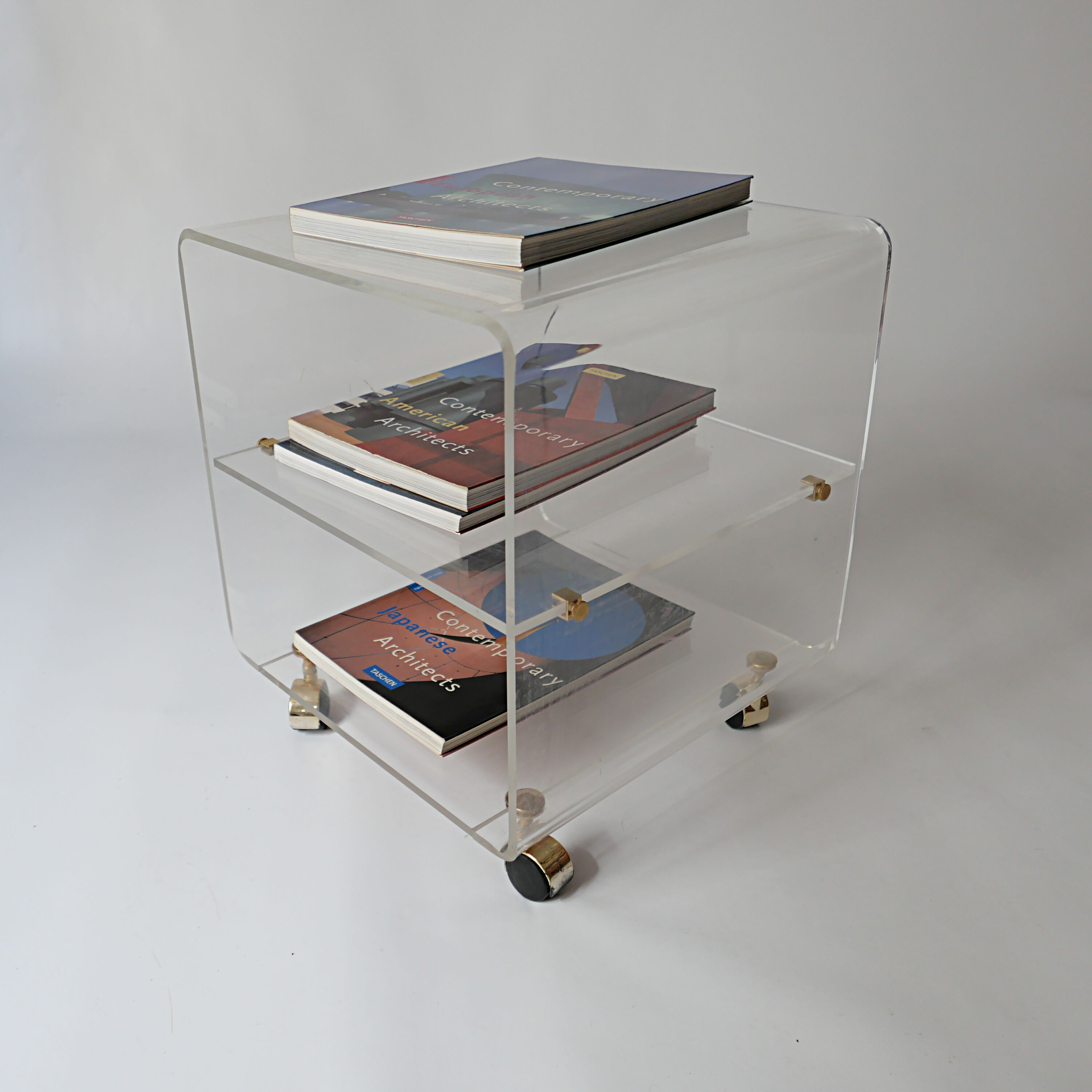 side table on wheels in plexiglass designed by David Lange 1970