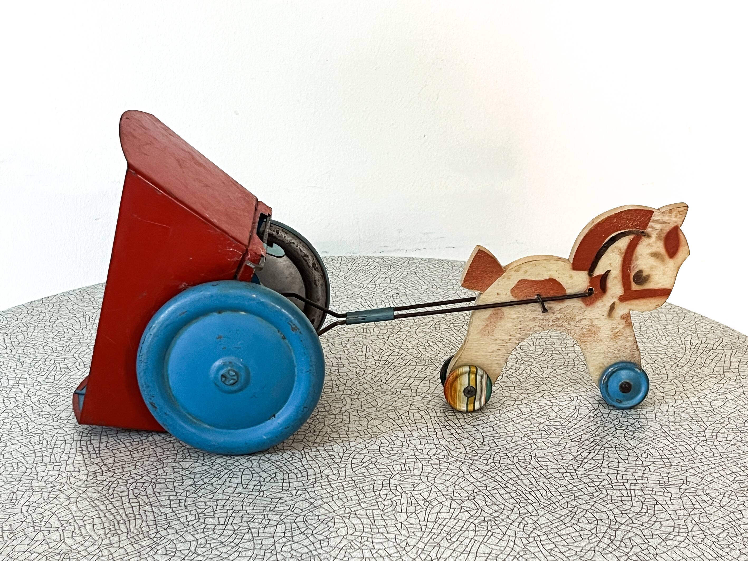 Horse cart and tin cart, old pull toy.