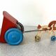 Horse cart and tin cart, old pull toy.