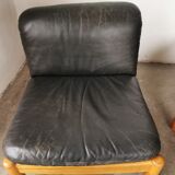Pair of designer leather armchairs 80s