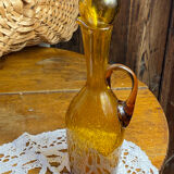 Blown glass oil dispenser with bubbles