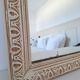 Miroir rectangle en bois et sculpté en bas-reliefs