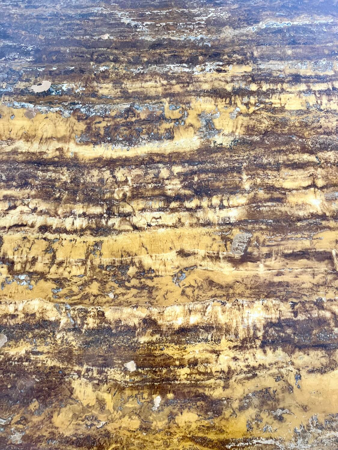 Old coffee table with golden marble top, 70s design, vintage wooden feet