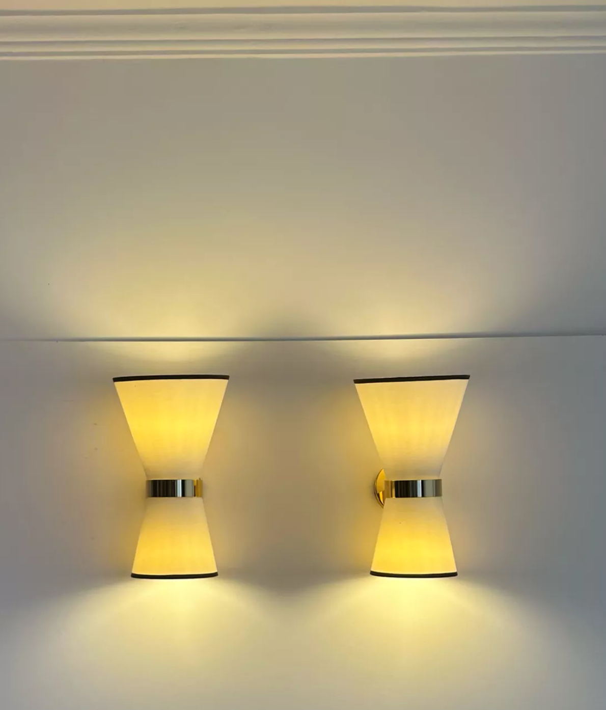 Pair of vintage wall lamps, solid brass and unbleached fabric, Italy 1980