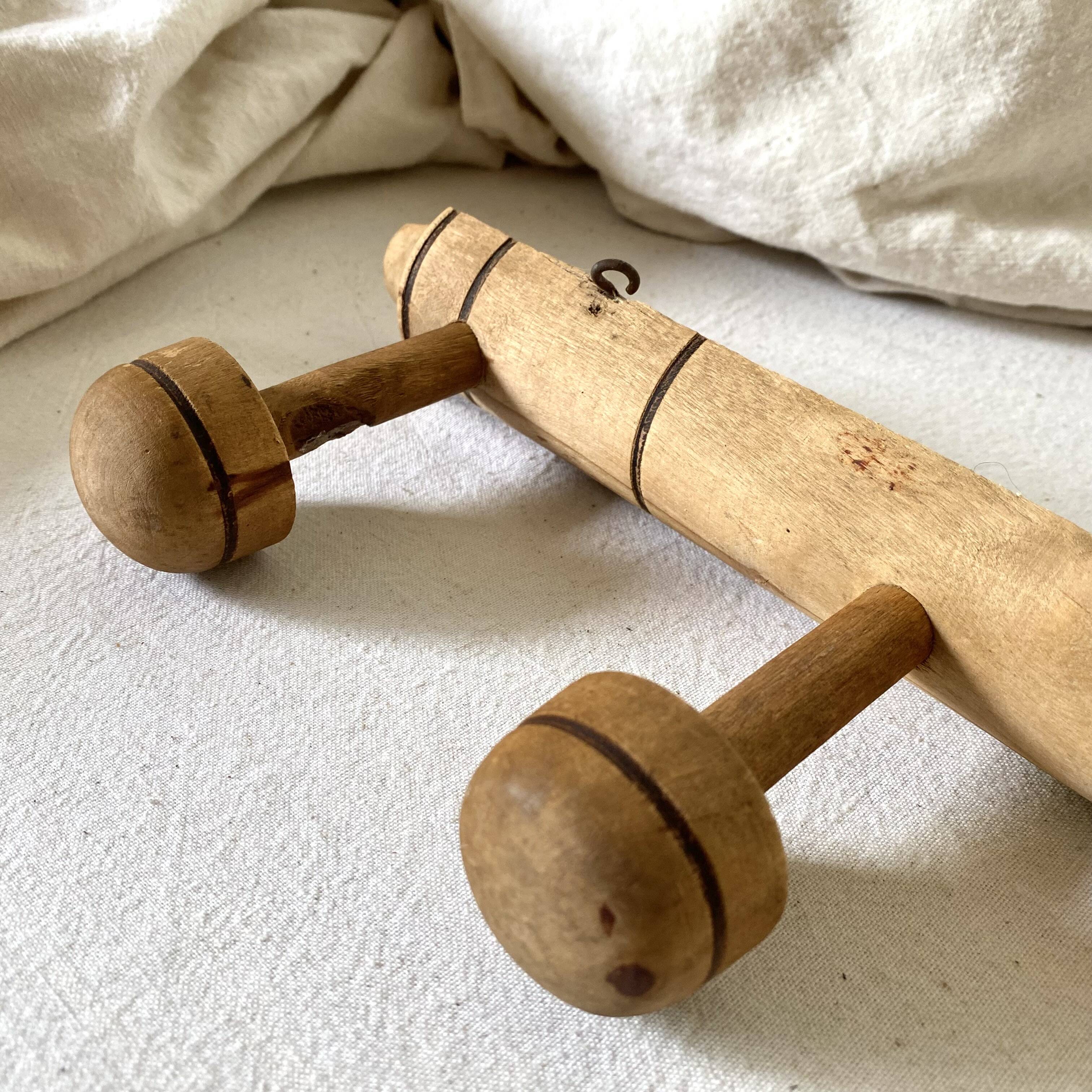 Turned wooden wall coat rack with 3 hooks