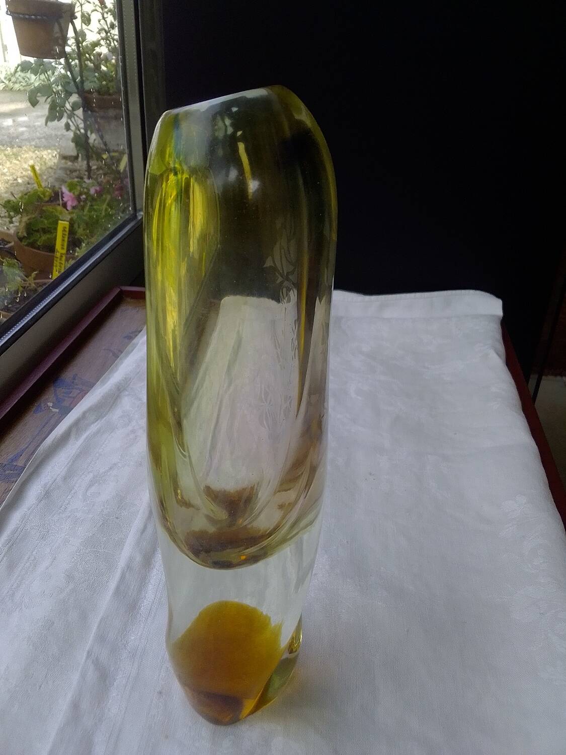 Amber-colored engraved crystal vase