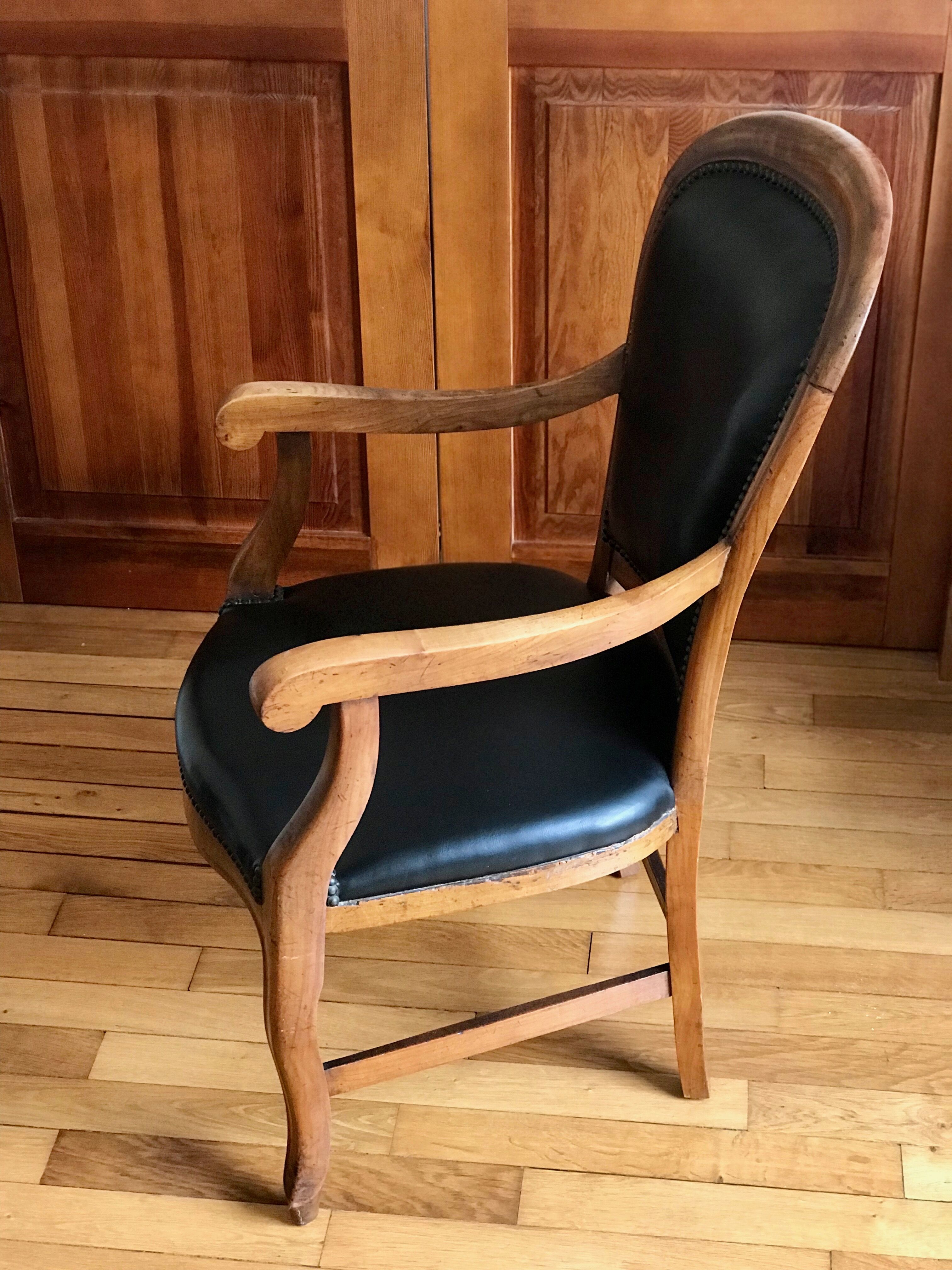 Wood and leather armchair