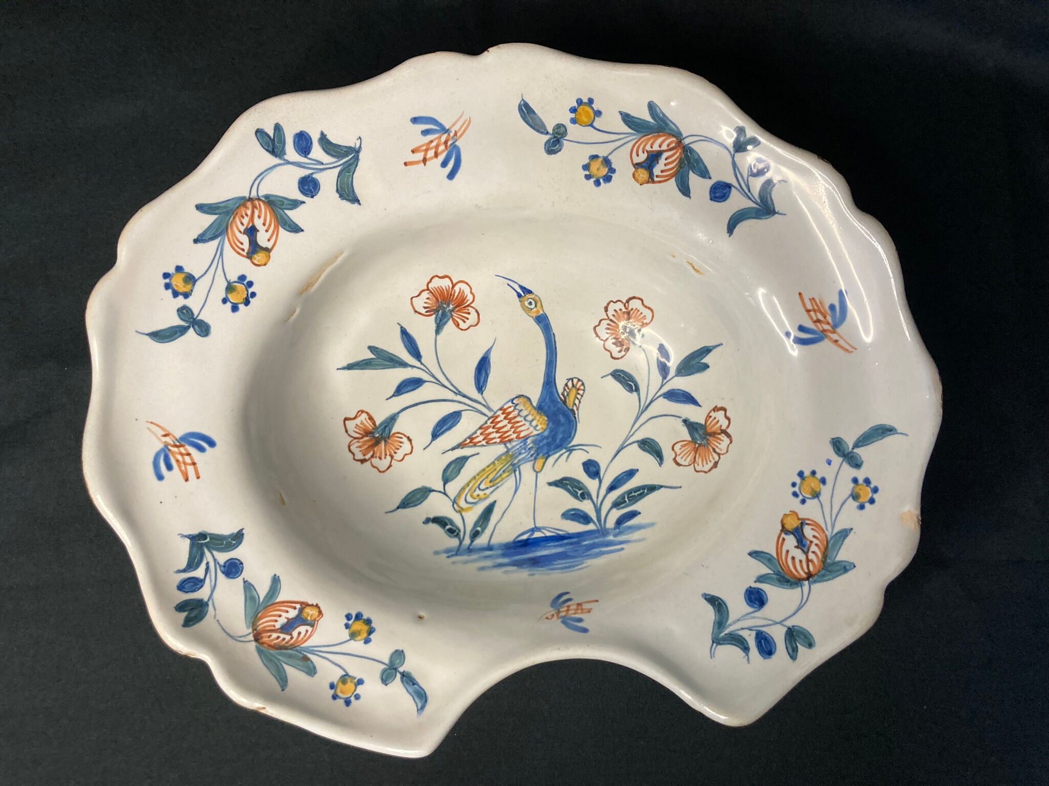 Antique polychrome earthenware shaving dish from La Rochelle, 18th century