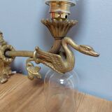 Swan and glass globe wall lamp