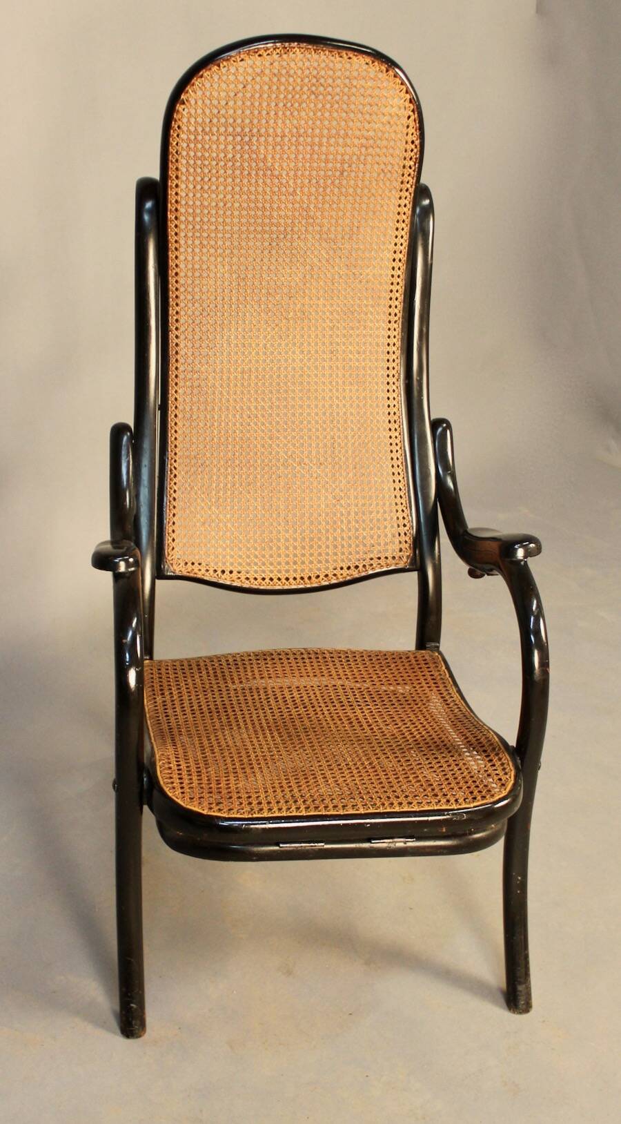 Bentwood cane armchair with mechanism and footrest