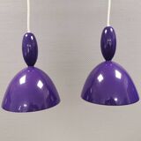 Two purple hanging lamps from Norway Says for Muuto, model Mhy