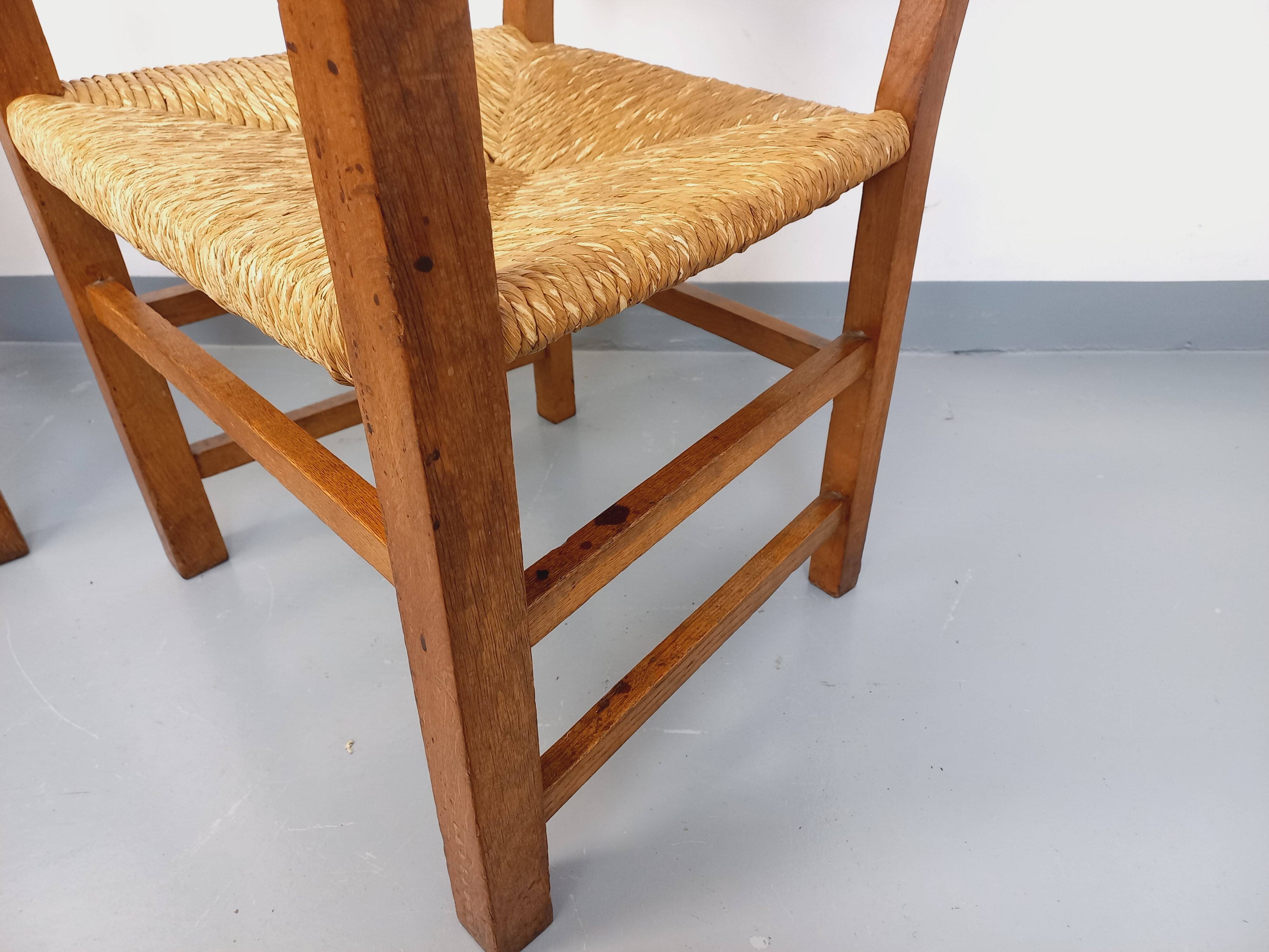 Set of 2 vintage brutalist armchairs in oak wood and straw