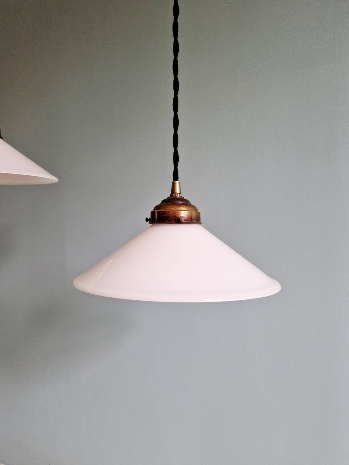Pair of Art Deco conical white opaline pendants, 1920-30.