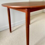 Round teak dining table Scandinavian design