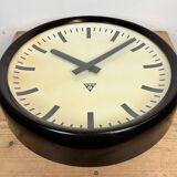 Industrial bakelite factory wall clock from Pragotron, 1960s