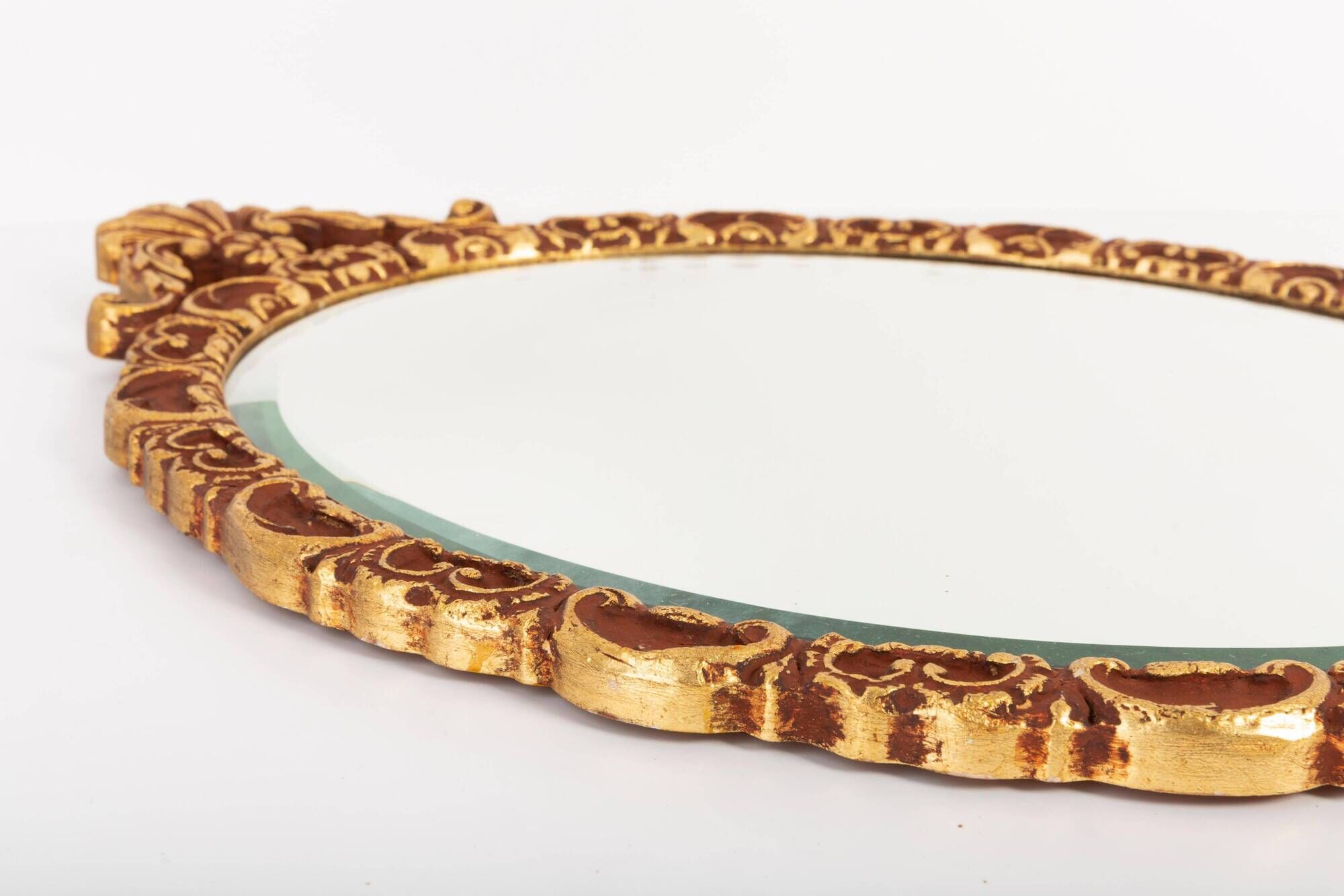 Vintage Italian mirror in gold and brown, gilded woodwork, 1960s.