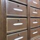 Notary's furniture from the early 20th century in oak with its cardboard box.
