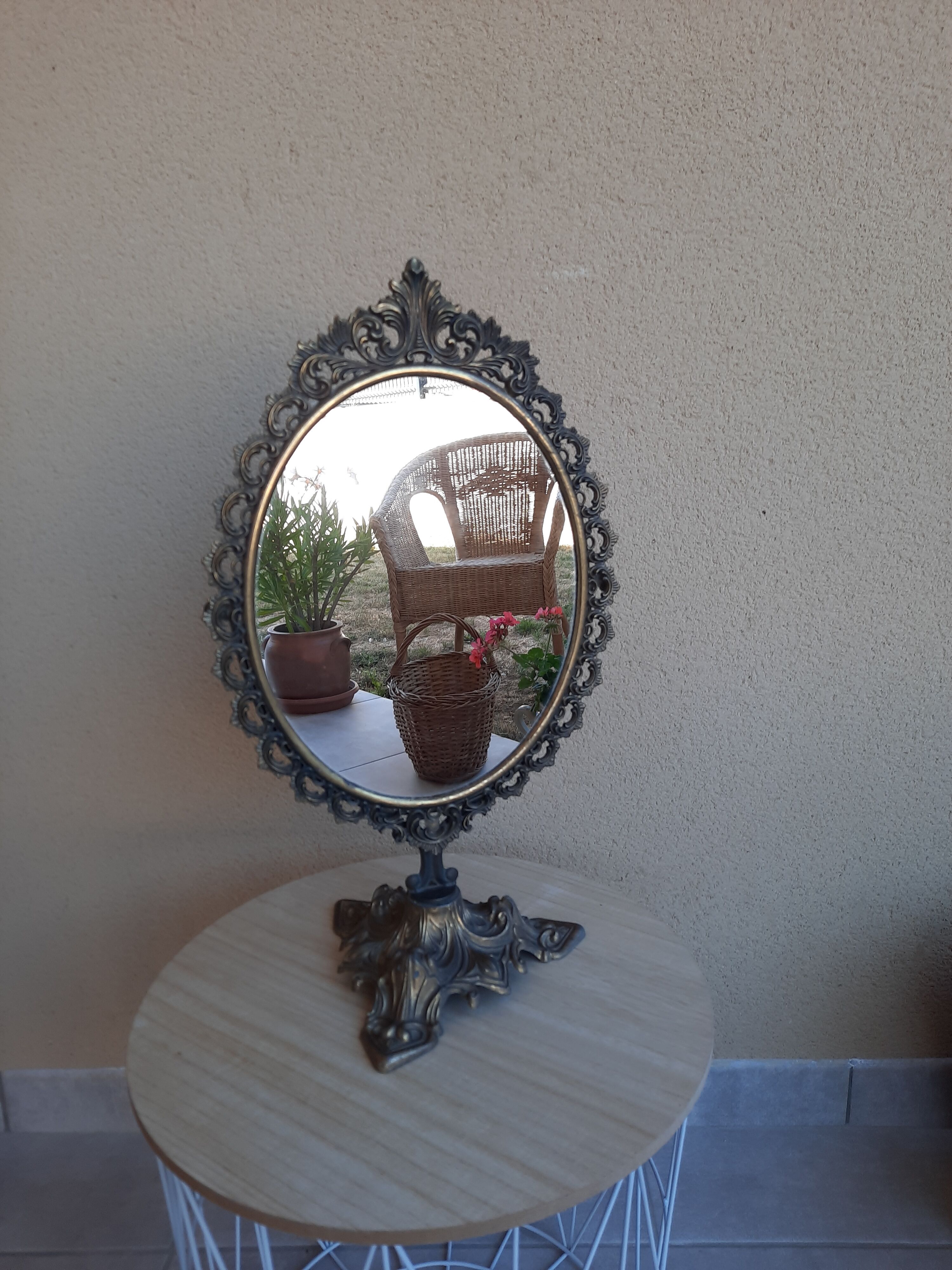 Mirror on foot, swivel, brass, mid-late nineteenth, rock style.