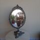 Miroir sur pied pivotant laiton milieu-fin XIXème de style rocaille.
