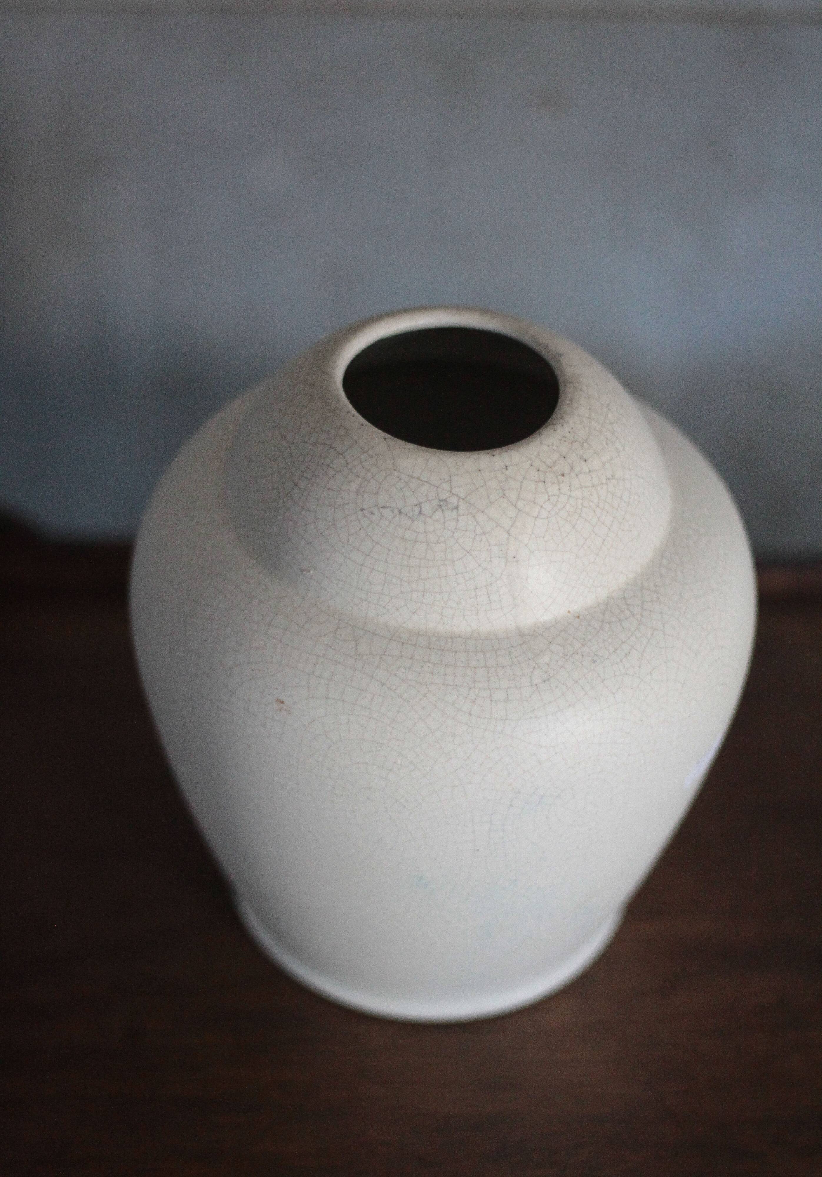 White earthenware vase by the French manufacturer Orchies.