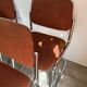Vintage 70s orange tubular chairs