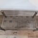 Vintage smoked glass coffee table with chrome legs.