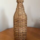 Bouteille en verre et rotin vintage