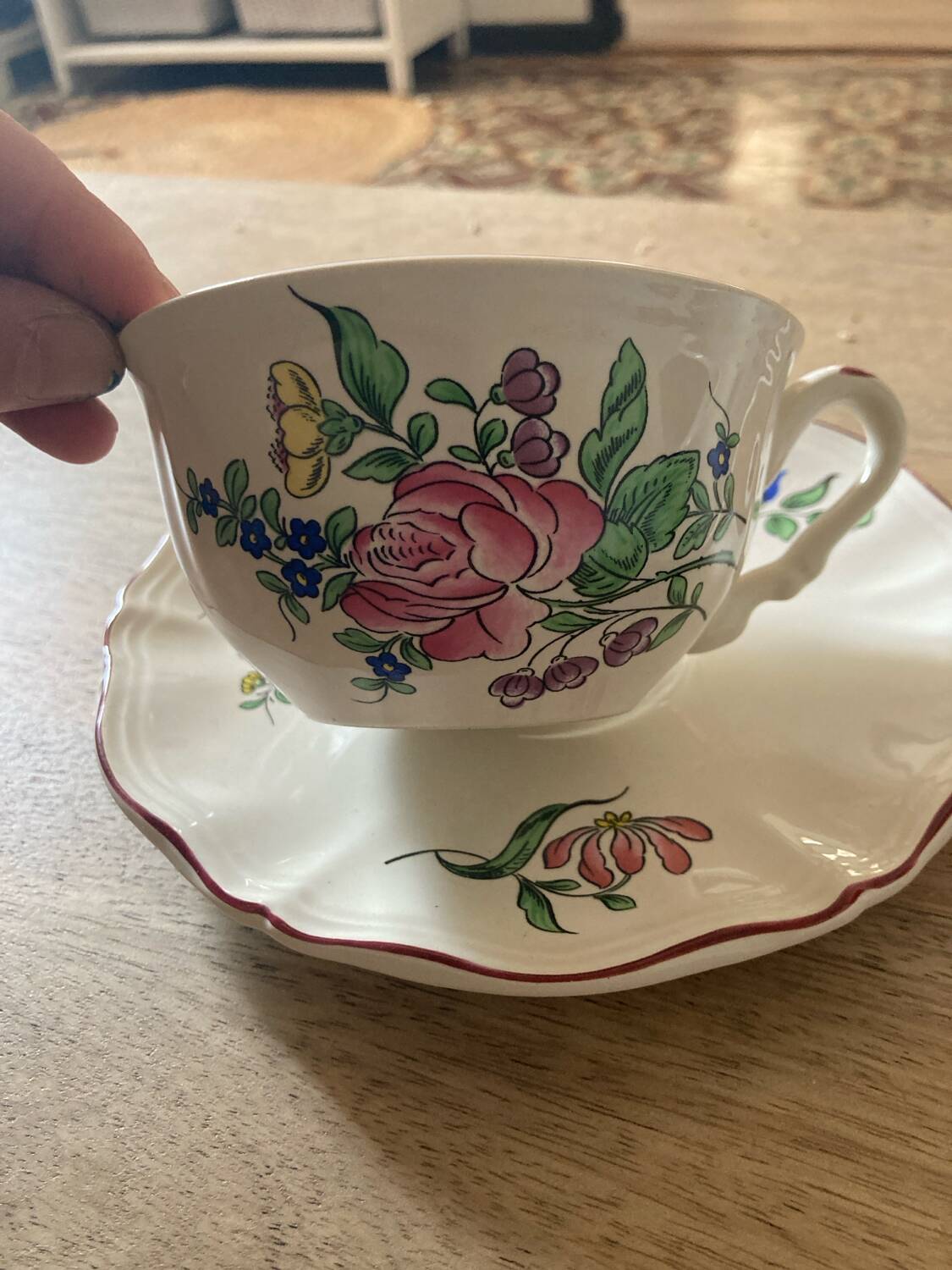 Two luneville cups with saucer