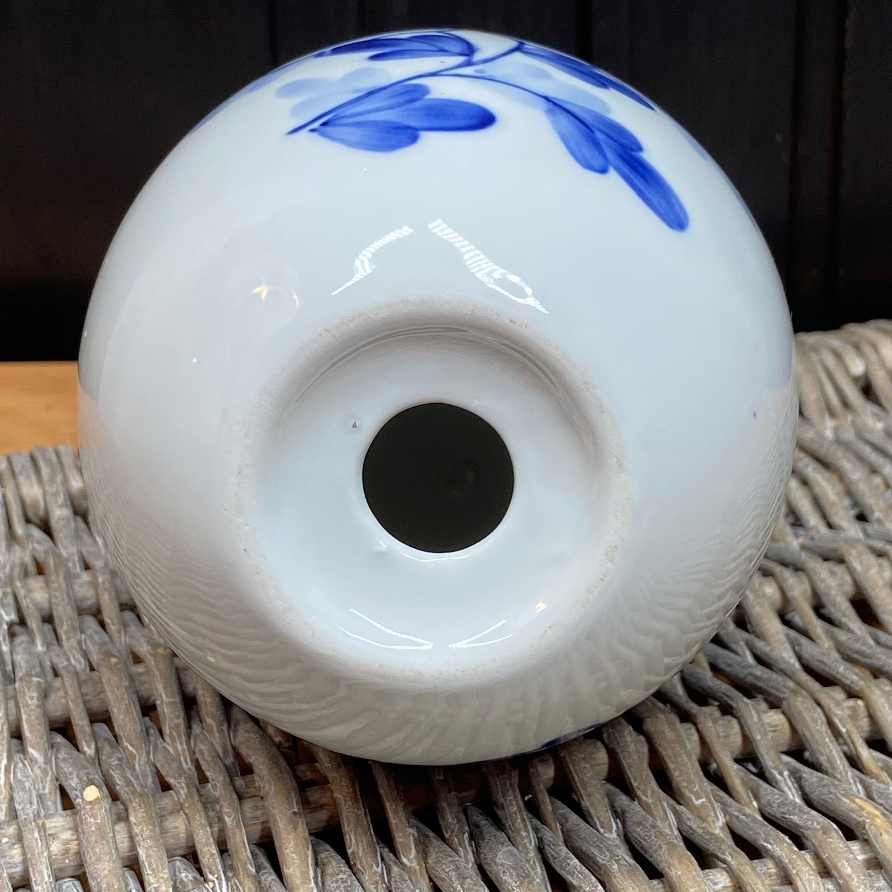 Decorative egg in white porcelain decoration blue flowers
