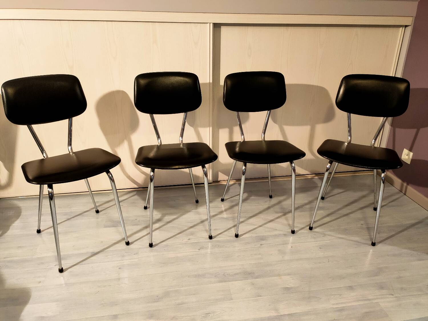 4 vintage chairs in black skai