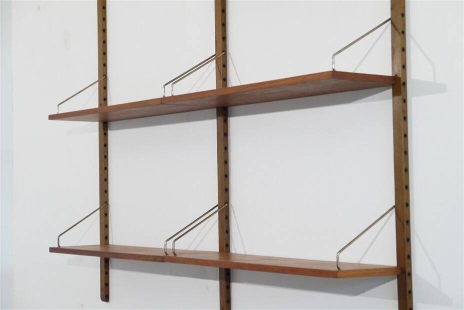 Danish wall shelving system in teak from the 1960s.