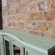 Renovated vintage sage green enfilade – wooden legs & bevelled display cabinets