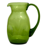 Green water jug in blown glass