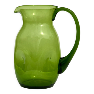 Green water jug in blown glass