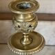 pair of openwork gilded brass candlesticks from the 19th century