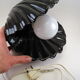Vintage shell table lamp in black enamel ceramics design seventies 1970