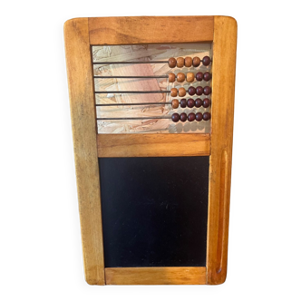 Old wooden abacus with slate