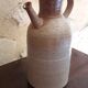 Vintage kid jug in two-tone sandstone with a handle and spout