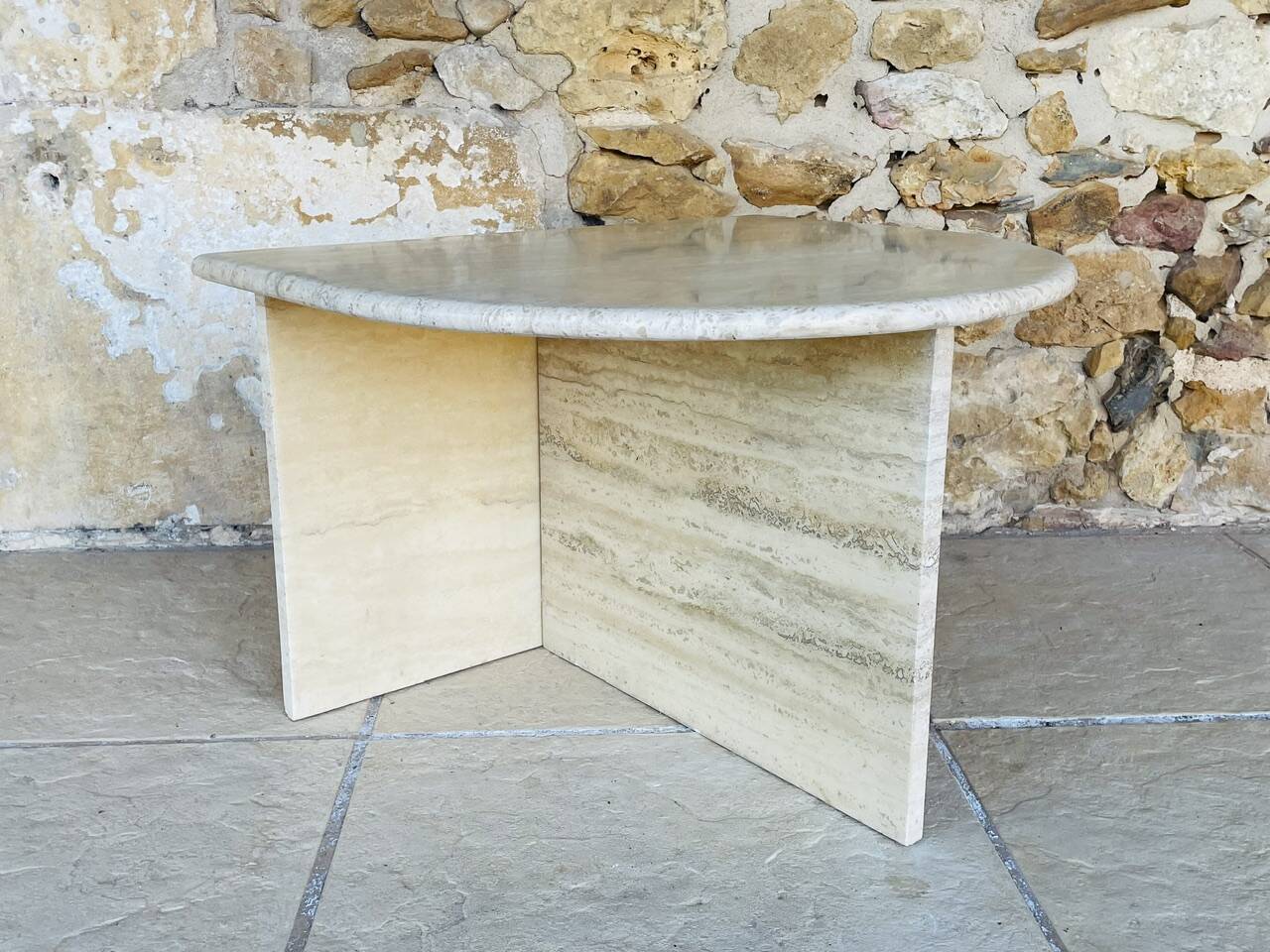 Vintage side table in travertine, circa 1980s.