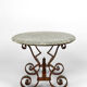 Art Deco round pedestal table in marble and wrought iron, circa 1940