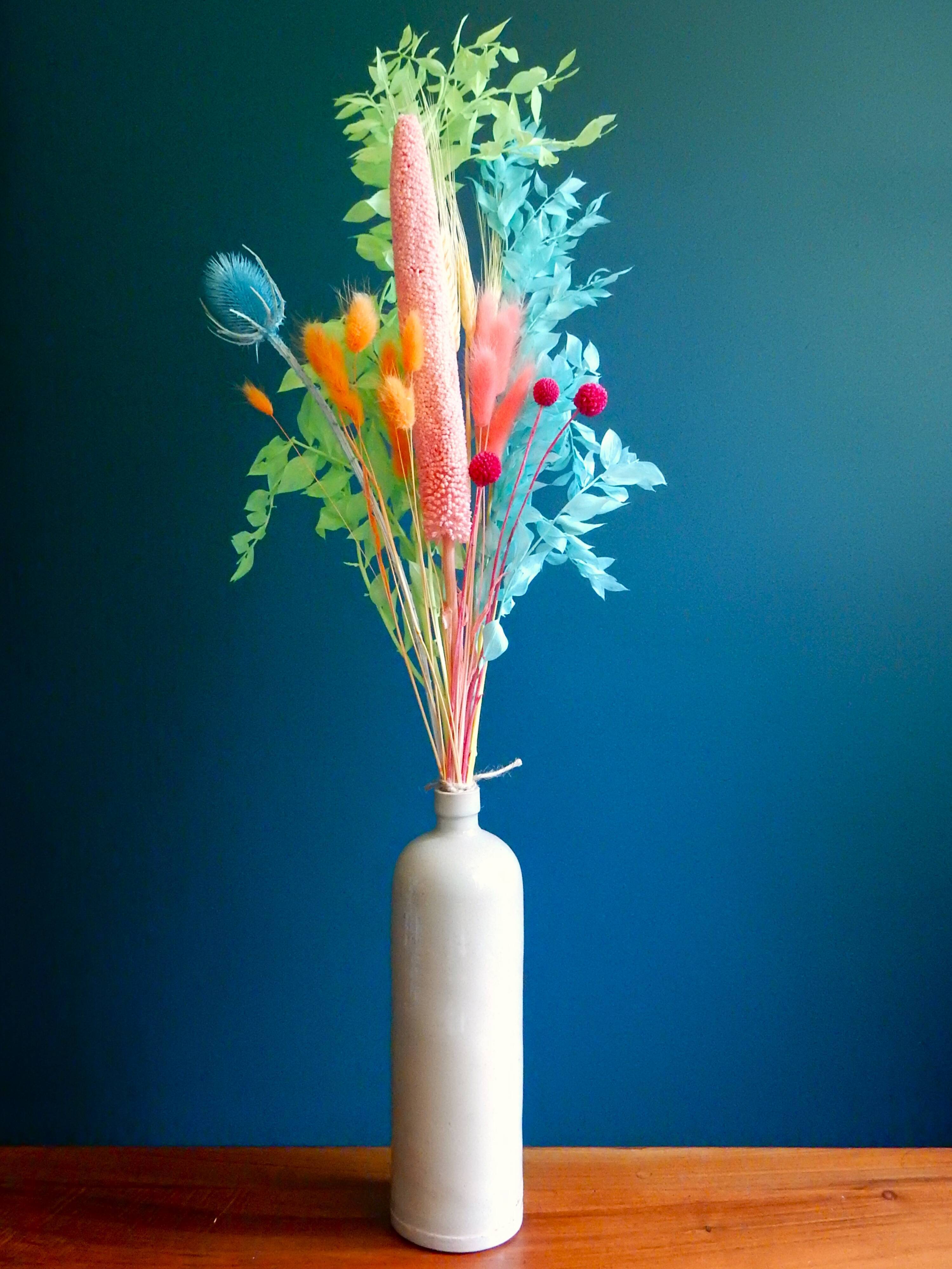 Enamelled white stoneware bottle