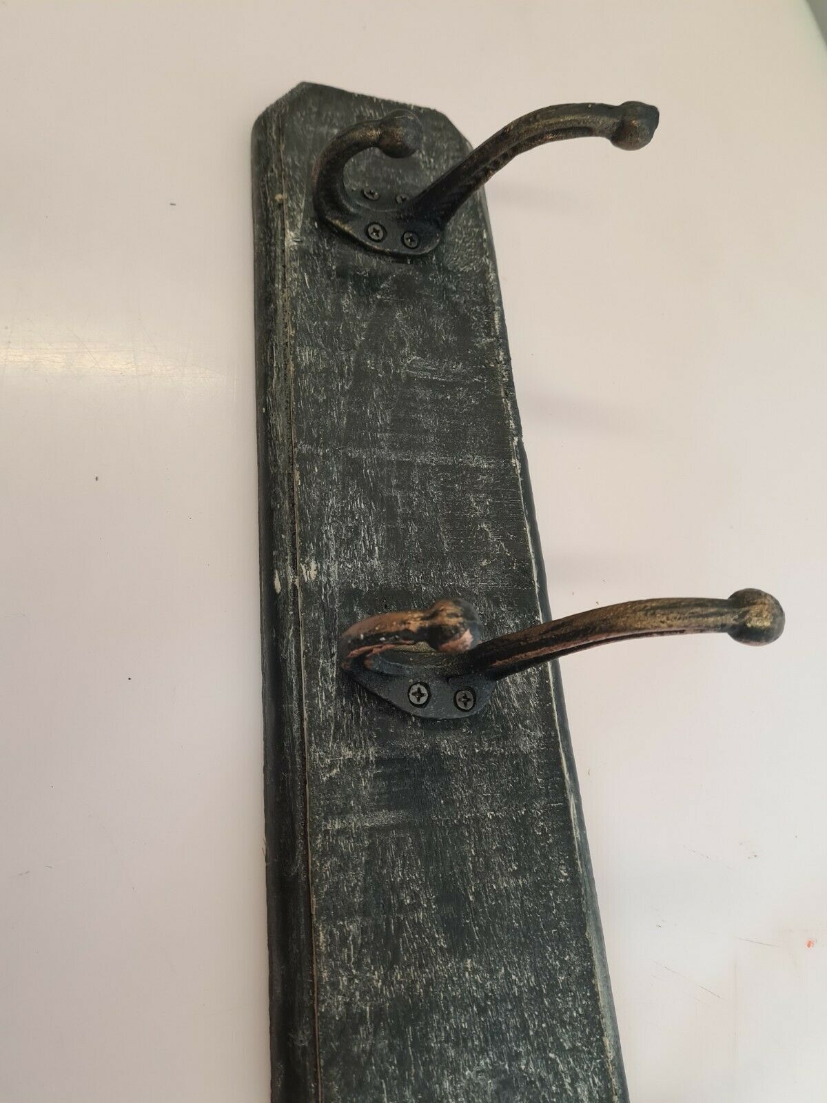 Coat rack in patinated wood and cast iron hooks