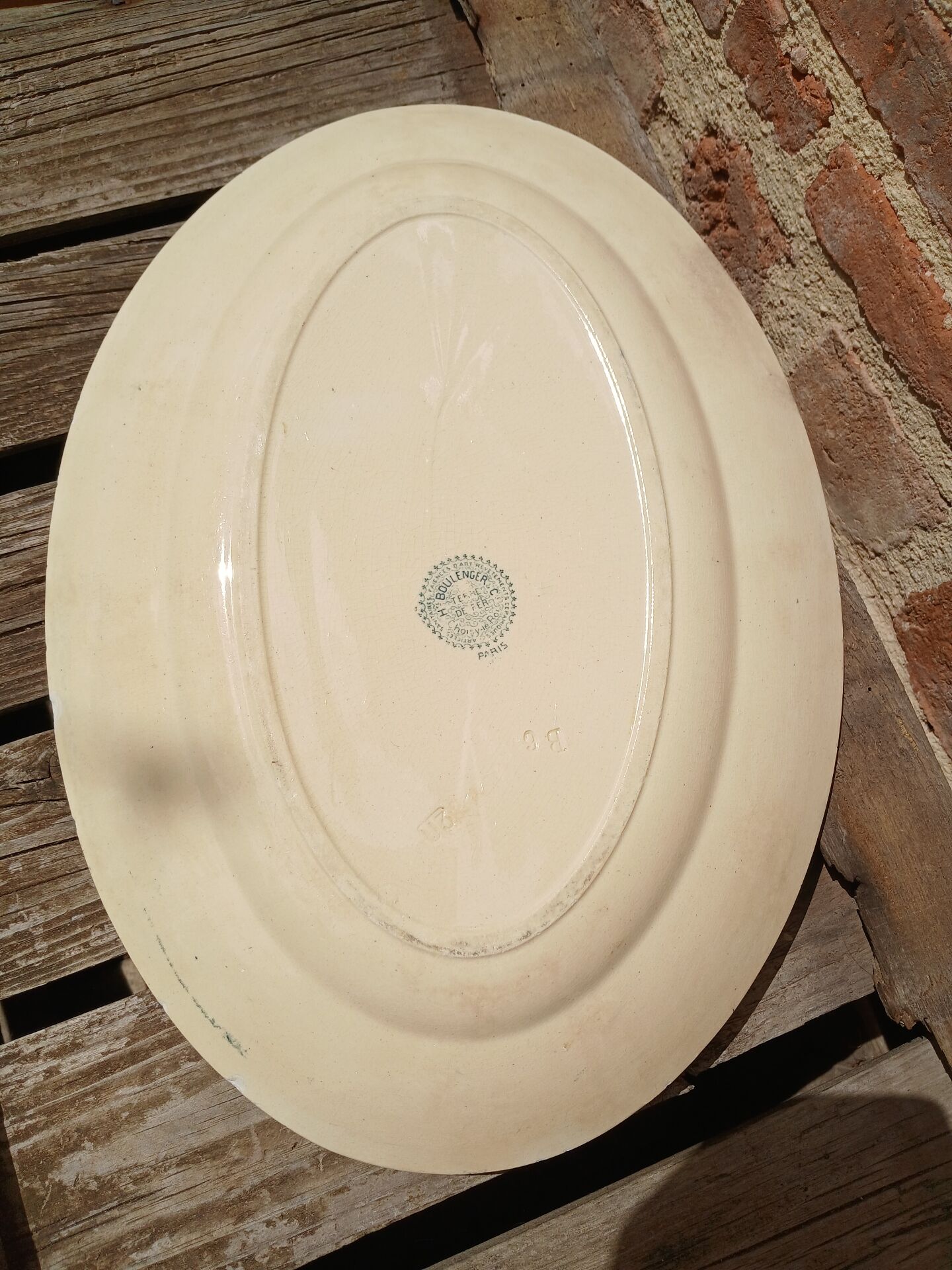Plat ancien en terre de fer Choisy le Roi 