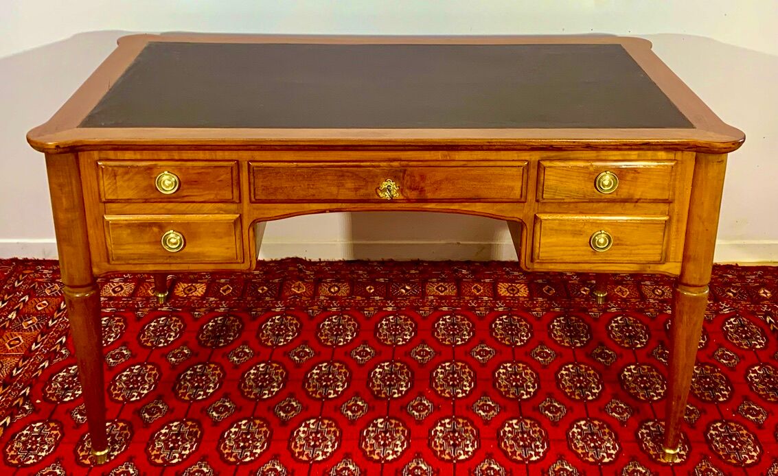Louis XVI desk in cherry wood and gilded bronzes