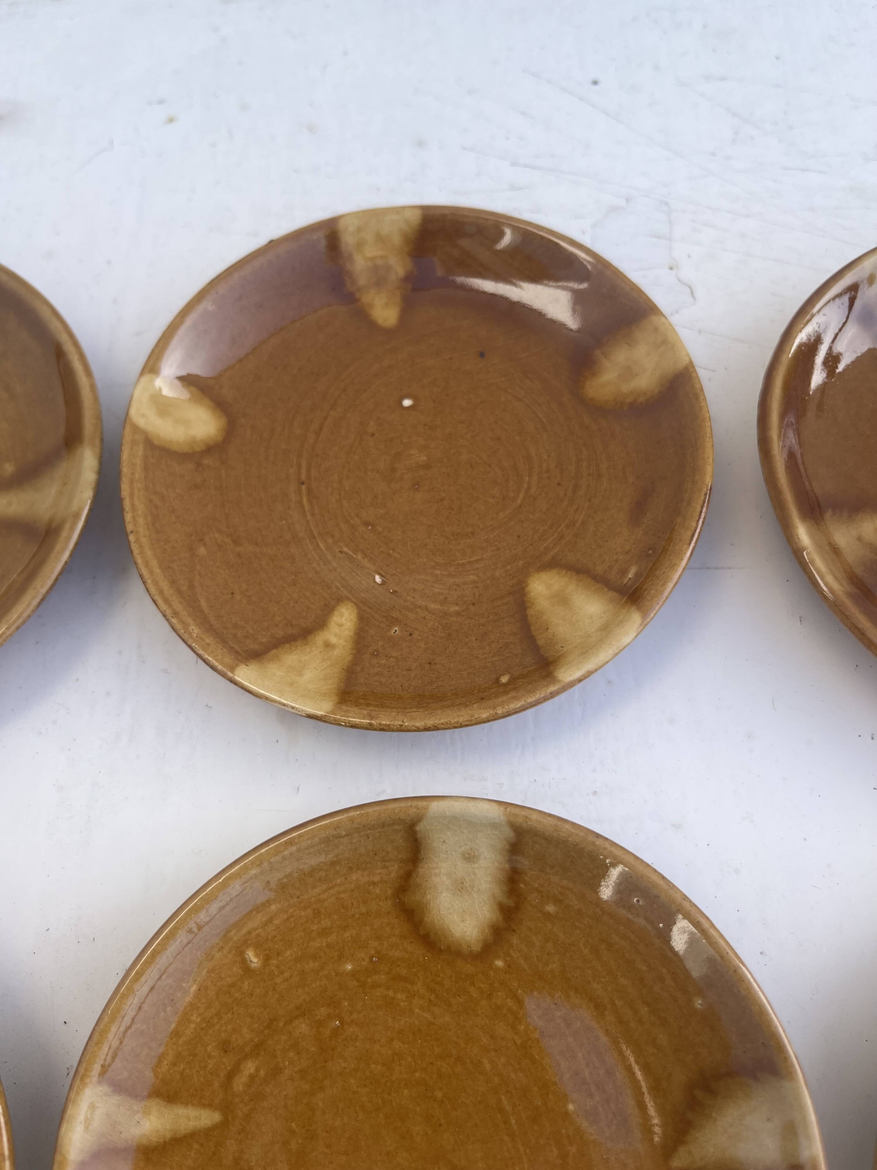 6 small vintage ceramic plates from the 1960s.
