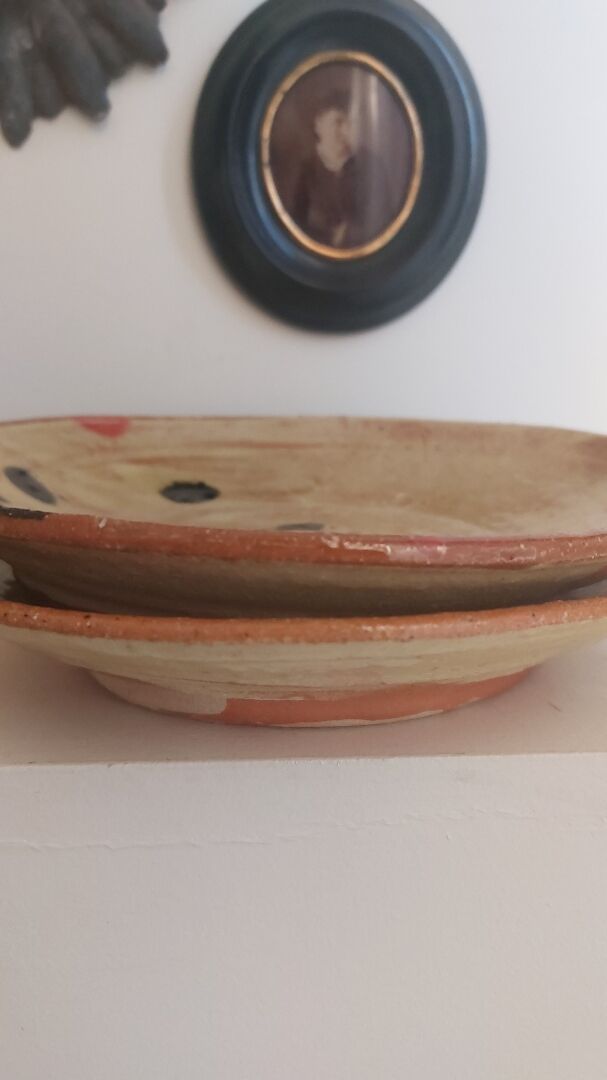 Decorated terracotta duo of dishes