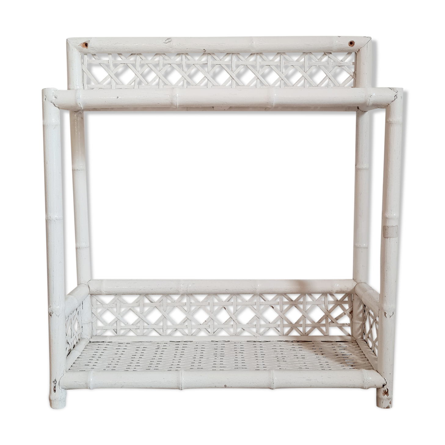 Vintage rattan and bamboo shelves painted white