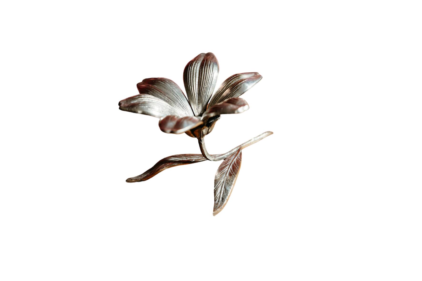 Vintage brass flower ashtray with removable petals.