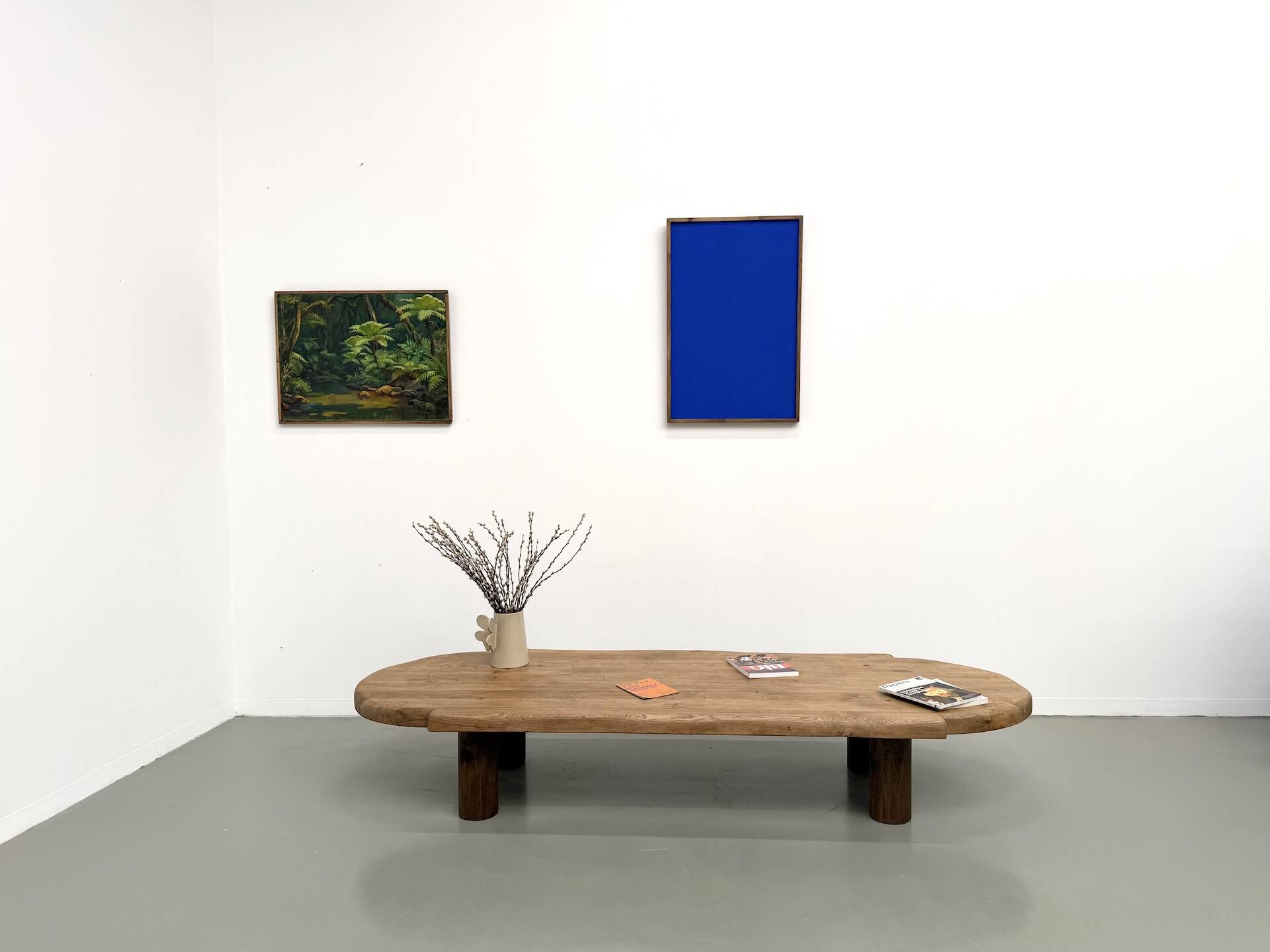 XXL oval coffee table in solid oak, cylindrical base, 1950s.