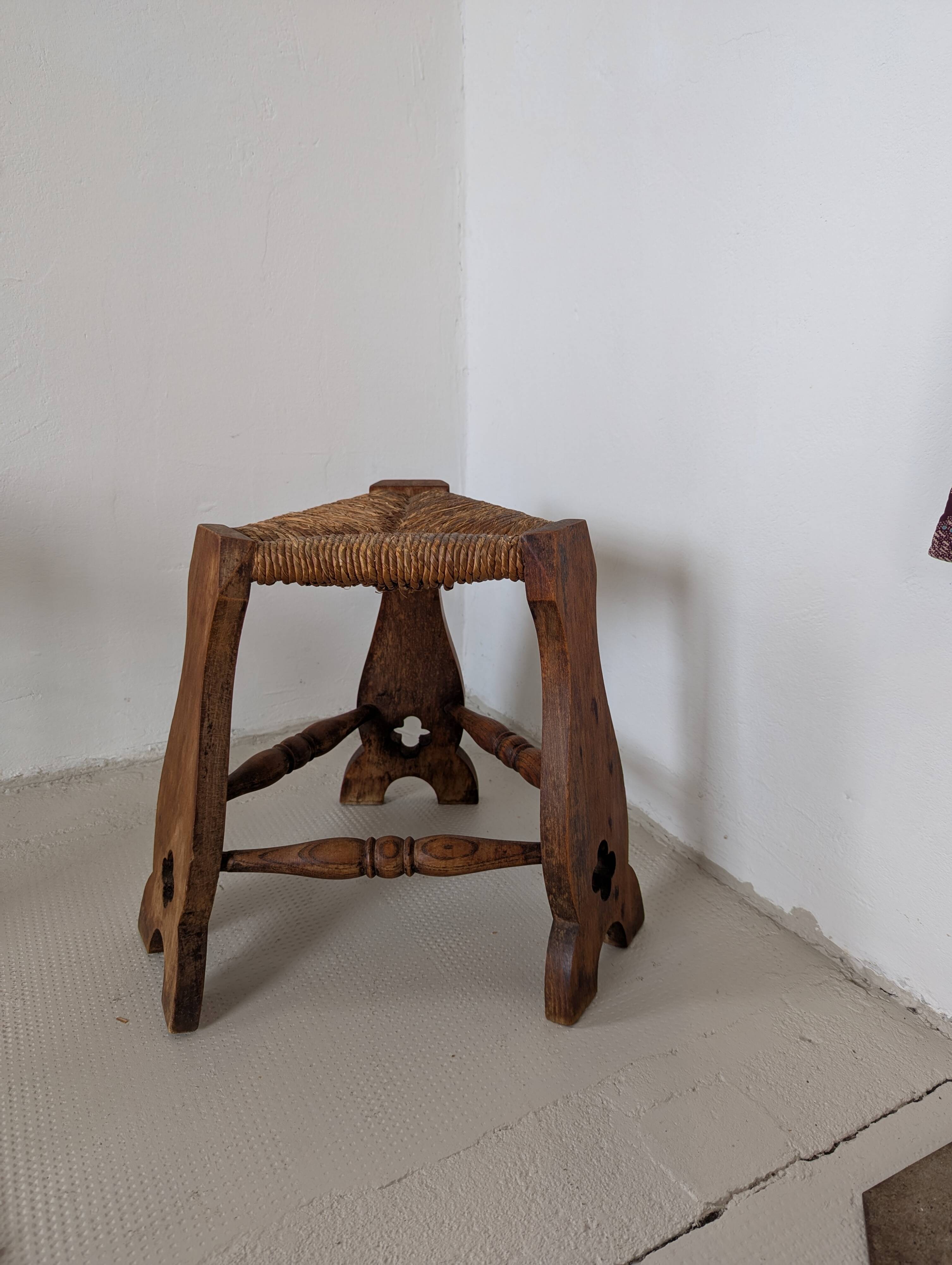 Low tripod farm stool in wood and straw